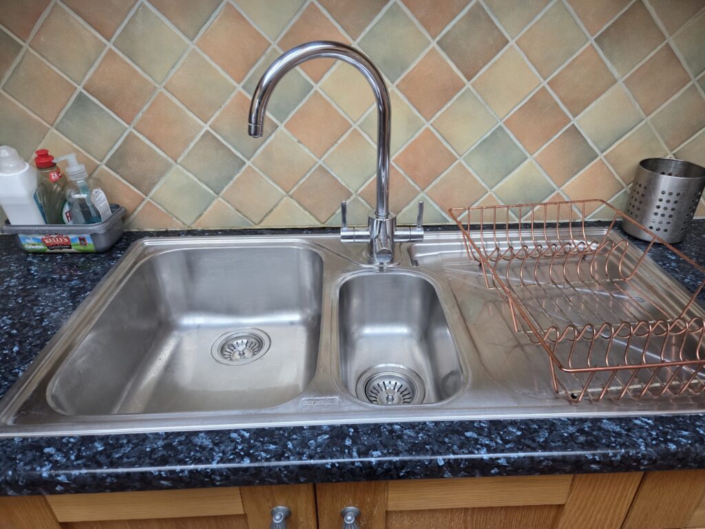 Limescale free. sink (well almost). This home suffers with hard water.
