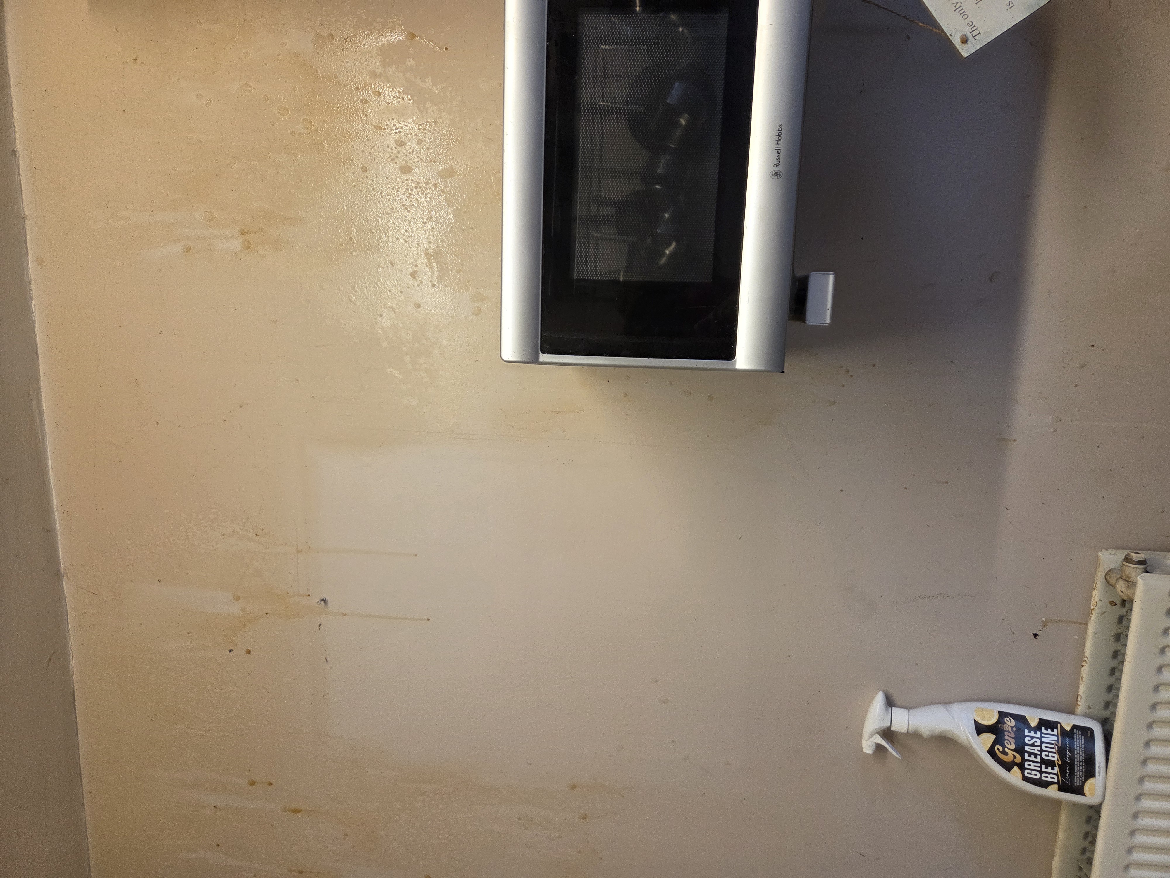 Nicotine and grease removal from kitchen wall. products getting to work.